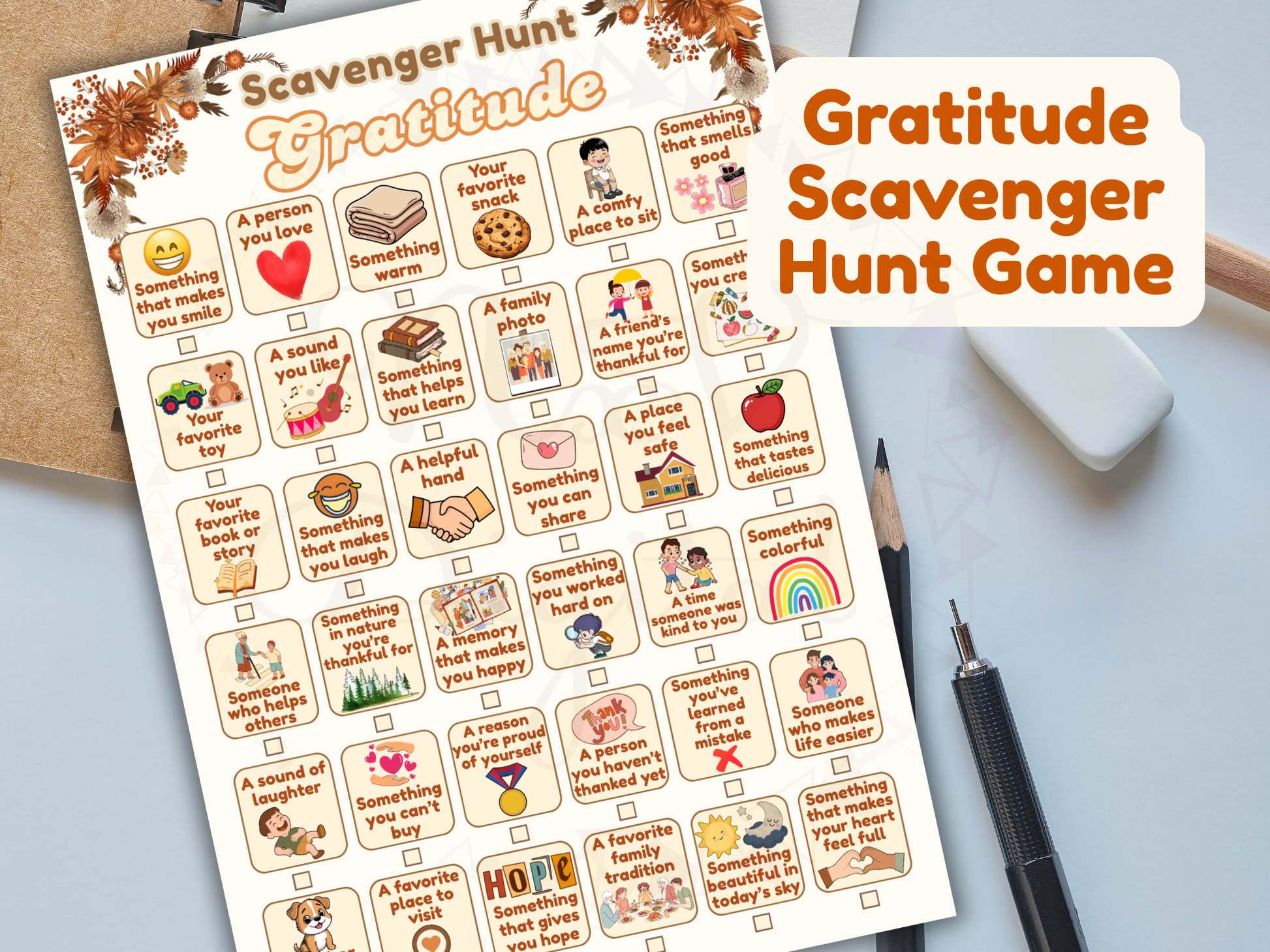 Gratitude Scavenger Hunt Game cards on a light blue background with a pen and paper.