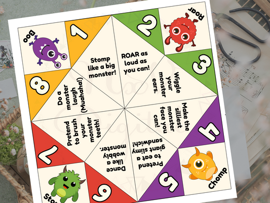 Children's fortune teller game with colorful design and cartoon monsters on a desk.