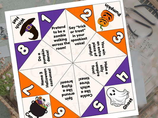 Halloween-themed fortune teller card on a surface with blurred background