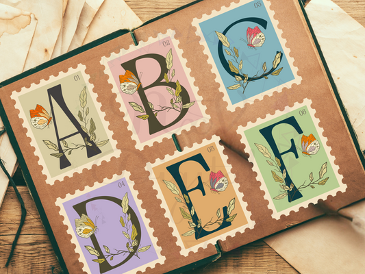 a to f alphabet stamp design on old junk journal book