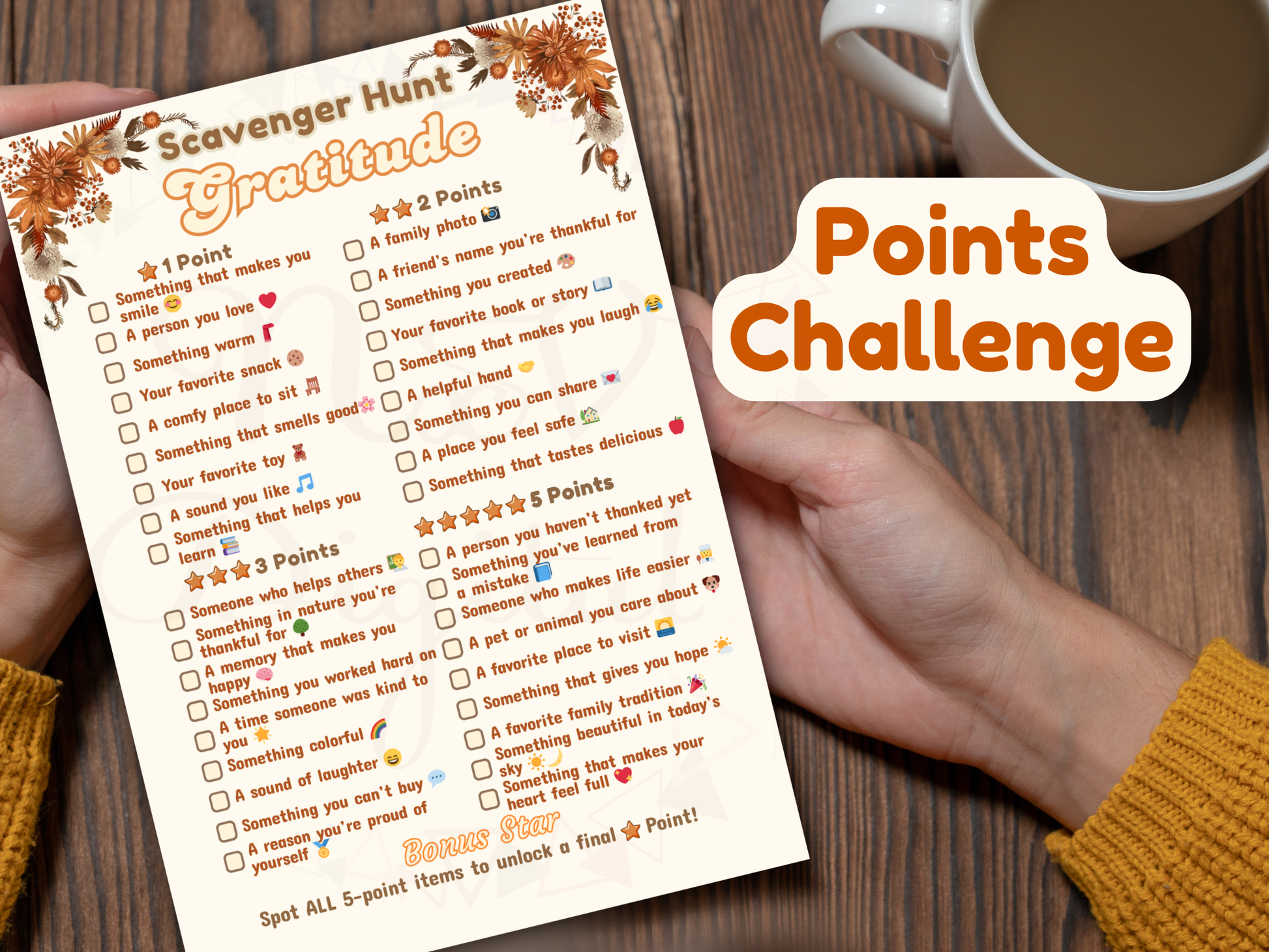 Scavenger hunt gratitude points challenge sheet held by a person with a cup of coffee on a wooden surface.