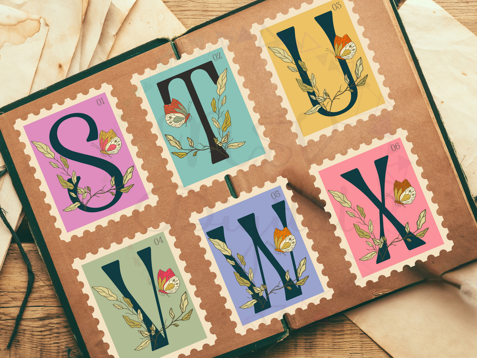 s to x alphabet stamp design on old junk journal book