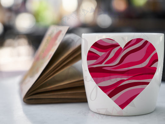 Contemporary heart-shaped art design in a mug