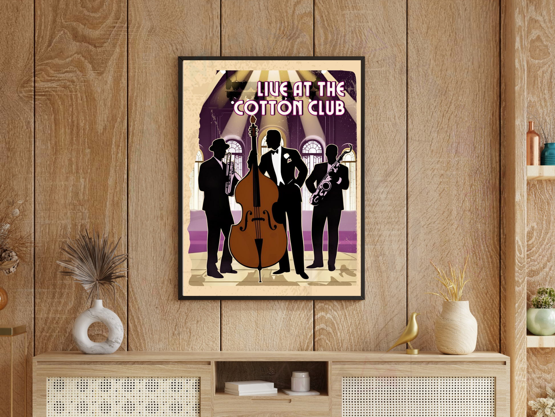 Retro jazz print held by hand against neutral wall