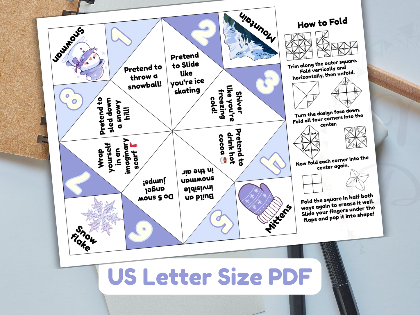 Cute winter-themed paper fortune teller with folding instructions on a white background.